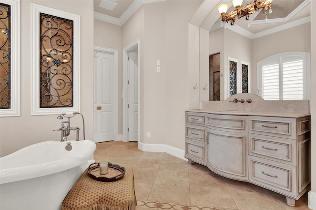 bathroom featuring vanity, ornamental molding, tile patterned flooring, and a tub to relax in