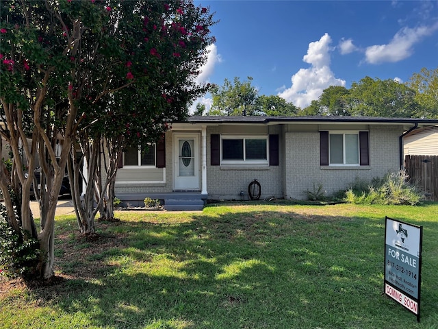 view of front of house with a front lawn