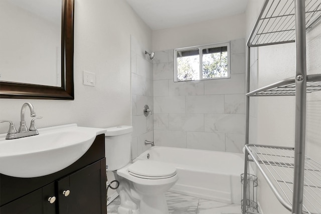 full bathroom with vanity, tiled shower / bath combo, and toilet