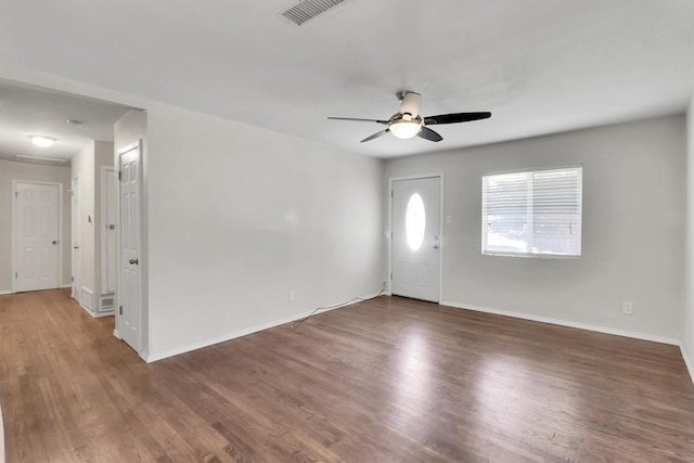 entrance foyer featuring ceiling fan and dark wood-type flooring