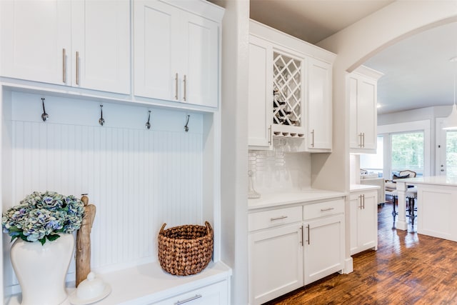 mudroom with dark hardwood / wood-style floors