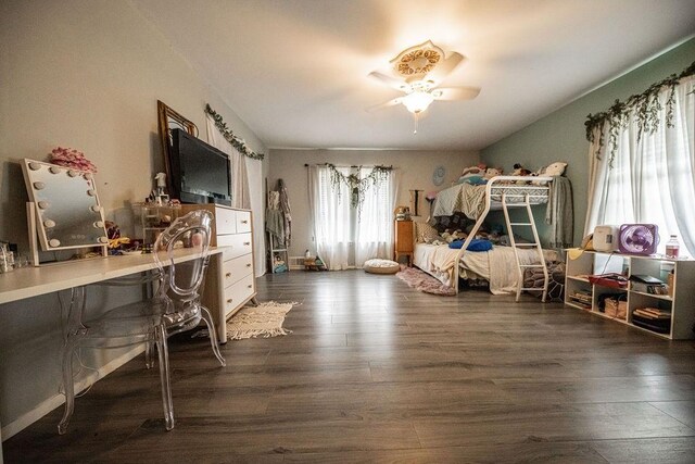 interior space with dark hardwood / wood-style floors and ceiling fan