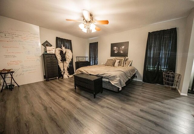 bedroom featuring ceiling fan and hardwood / wood-style floors