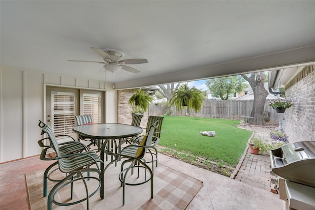 view of patio / terrace with a grill and ceiling fan