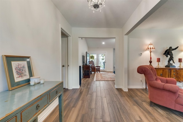 hall with dark hardwood / wood-style floors