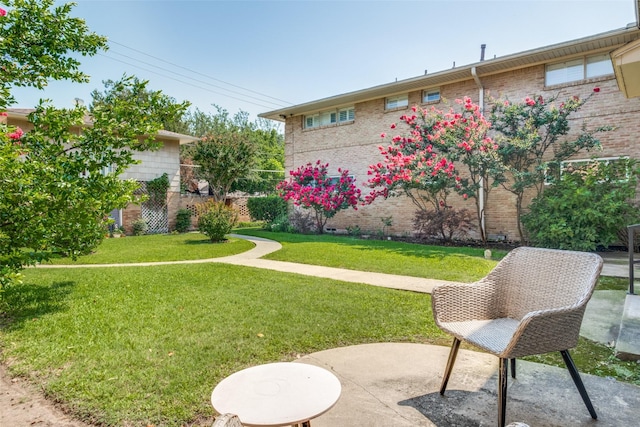 6131 Bandera Ave Unit A, Dallas, TX 75225 - view of yard with a patio