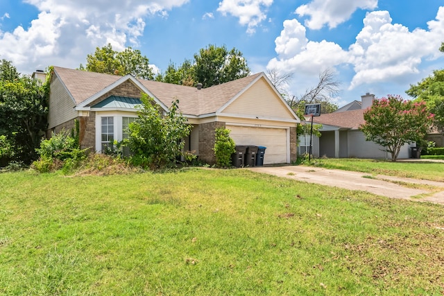 view of front of home featuring a garage and a front yard