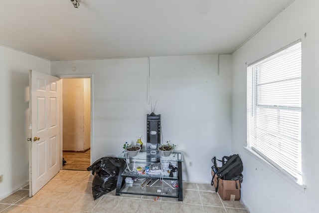 miscellaneous room featuring light tile patterned floors