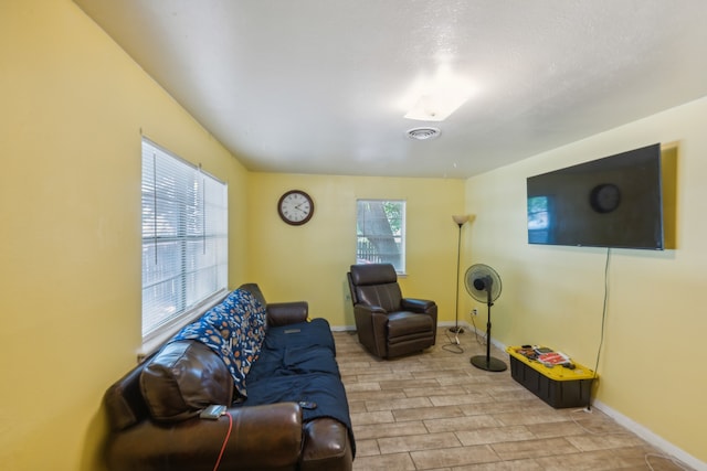 living room with light hardwood / wood-style flooring