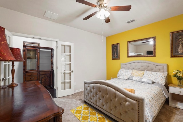 bedroom with light carpet and ceiling fan