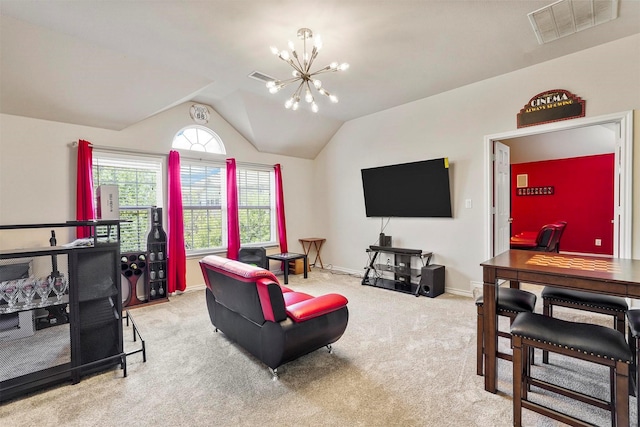 living room featuring vaulted ceiling, carpet floors, and an inviting chandelier