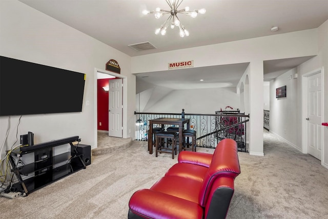 living room featuring a notable chandelier and carpet