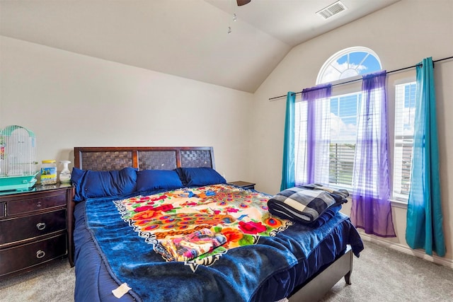 bedroom with lofted ceiling, light carpet, and ceiling fan