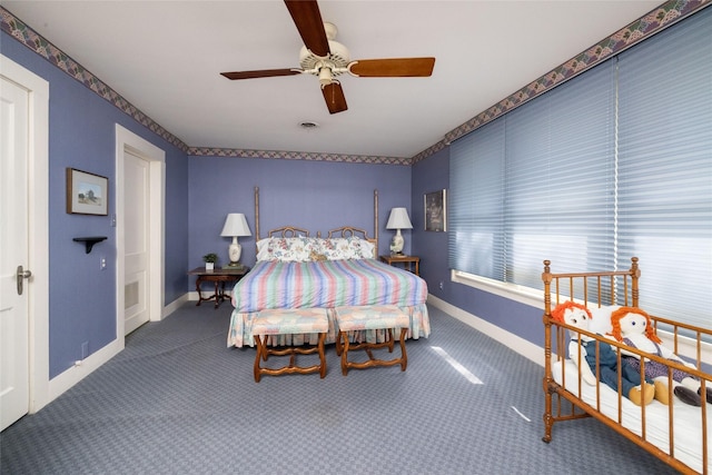 bedroom featuring ceiling fan and carpet flooring