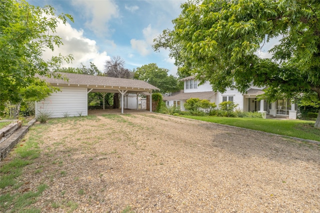 view of front of house with a carport