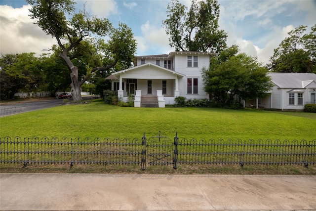 view of front facade with a porch and a front lawn