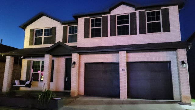 view of front of home featuring a garage