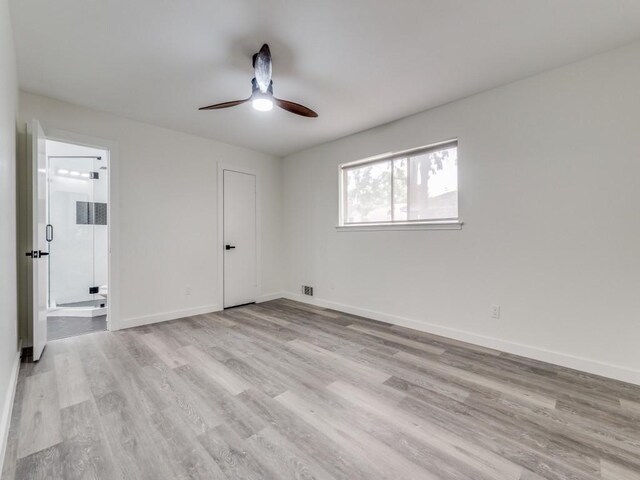 unfurnished room featuring light hardwood / wood-style floors and ceiling fan