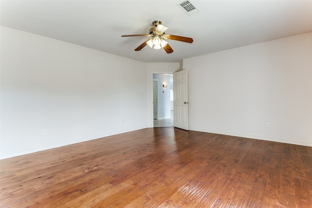 spare room featuring ceiling fan and wood-type flooring