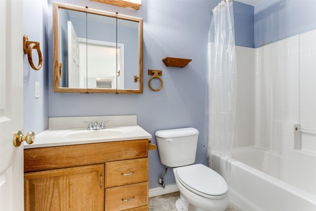 full bathroom with toilet, shower / bath combo with shower curtain, and vanity