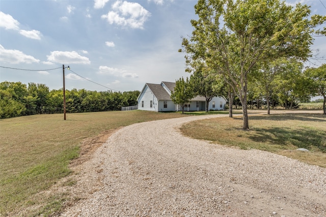 view of front of home featuring a front lawn