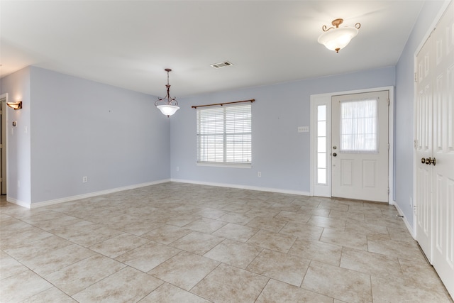 entrance foyer featuring light tile patterned floors