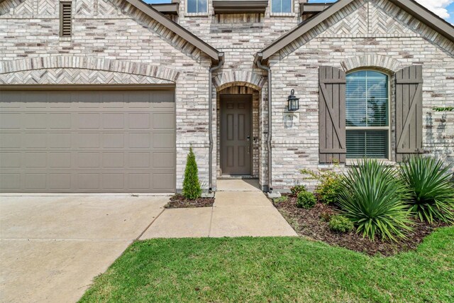 entrance to property with a garage