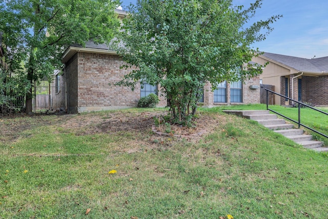 view of front of home with a front lawn