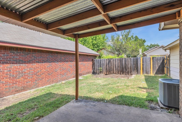 view of yard with a patio area and cooling unit