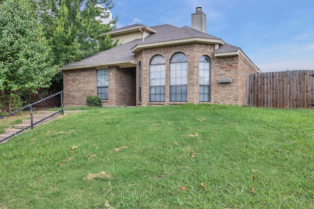 view of front of property with a front yard