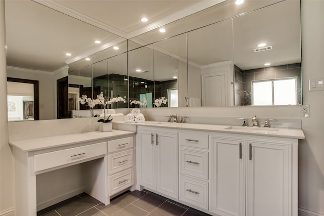 bathroom featuring tile patterned flooring, double sink vanity, and crown molding