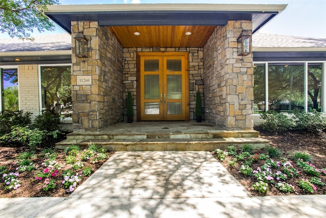 entrance to property featuring french doors