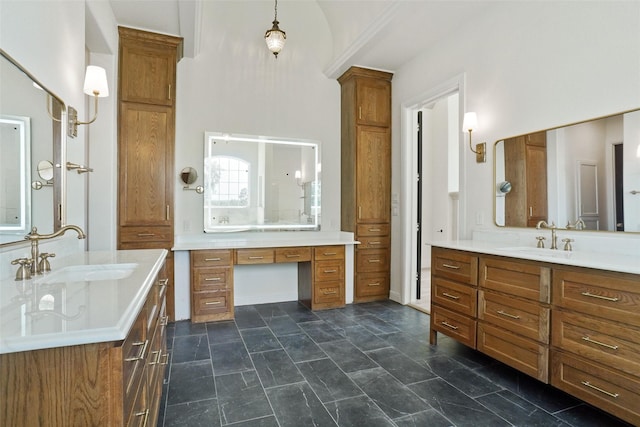 bathroom with vanity and a towering ceiling