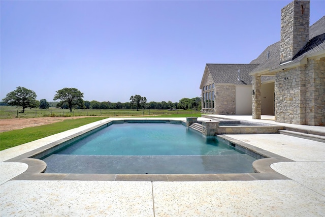 view of pool featuring an in ground hot tub and a patio area