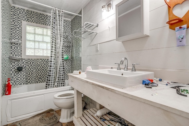 full bathroom with shower / bath combo, toilet, vanity, and ornamental molding