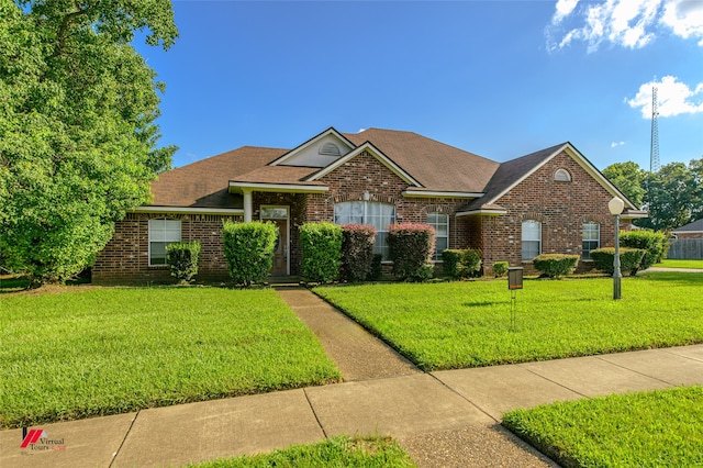 view of front of home with a front yard