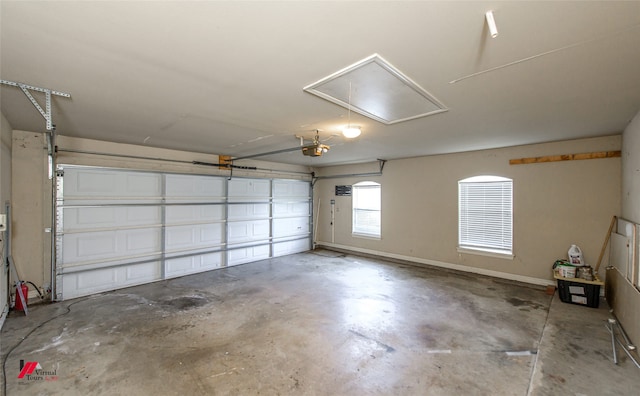 garage featuring a garage door opener