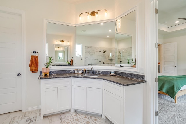 bathroom with vanity and an enclosed shower