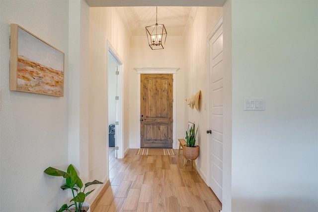 interior space with light hardwood / wood-style flooring and a chandelier