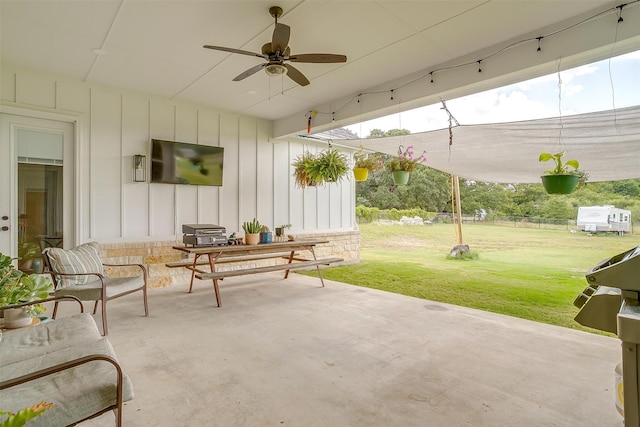 view of patio / terrace featuring ceiling fan