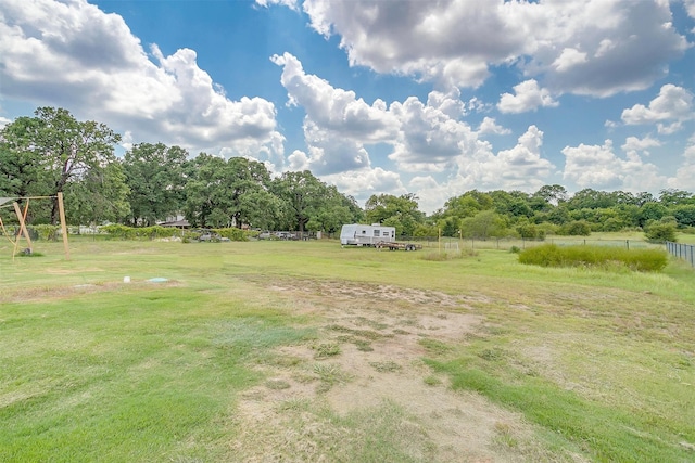 view of yard with a rural view