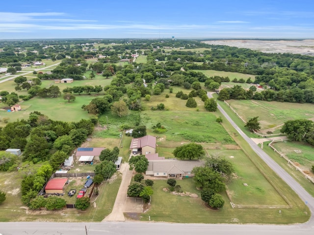 birds eye view of property featuring a rural view