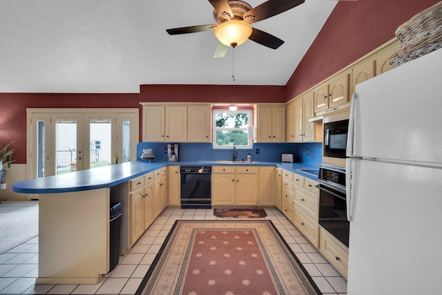 kitchen featuring french doors, sink, light tile patterned floors, light brown cabinets, and black appliances