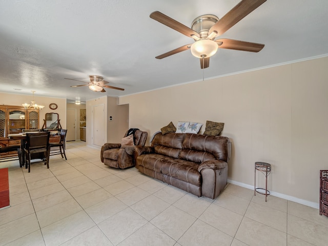 tiled living room featuring crown molding and ceiling fan with notable chandelier