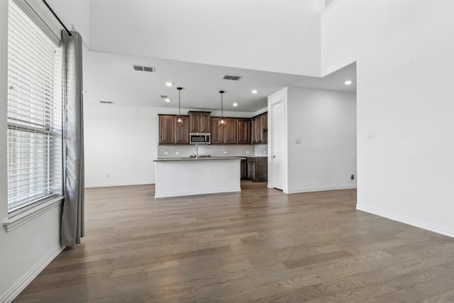 interior space with plenty of natural light and wood-type flooring