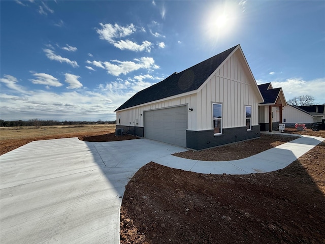 view of property exterior with a garage