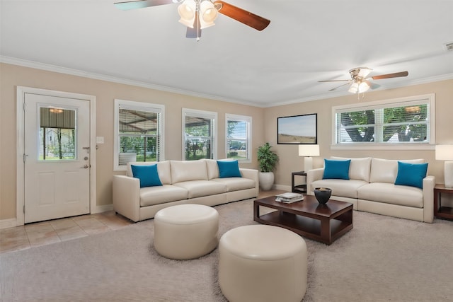 tiled living room with plenty of natural light, crown molding, and ceiling fan