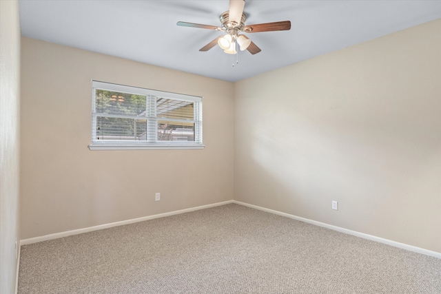 unfurnished room with carpet and ceiling fan