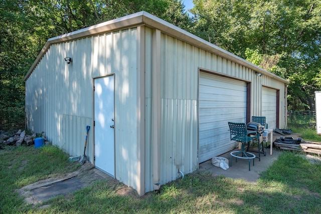 view of outbuilding with a garage