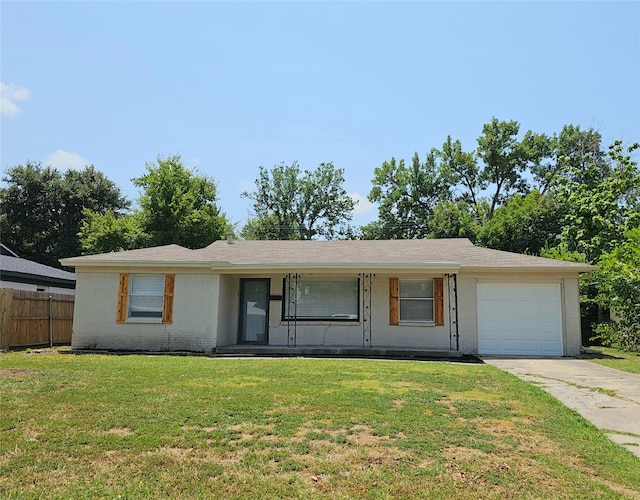 single story home featuring a garage, a front lawn, and a porch